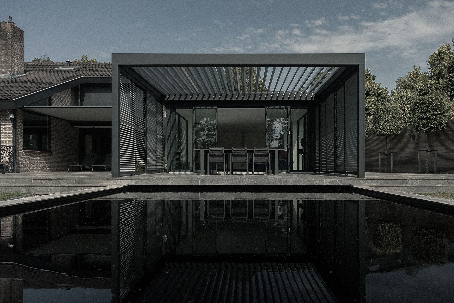 Aanzicht gevel en vijver D Residence Alkmaar — COAST architecten Amsterdam